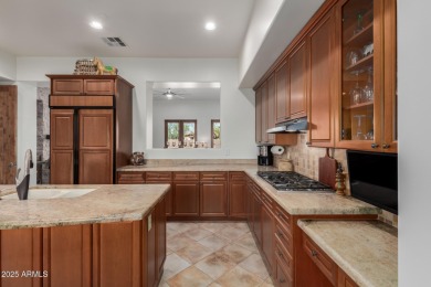 Step inside to discover a bright, sophisticated interior with a on Superstition Mountain Club - Lost Gold in Arizona - for sale on GolfHomes.com, golf home, golf lot