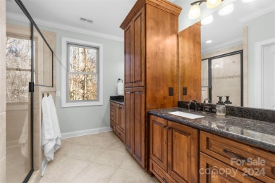 This stunning residence boasts 4 spacious bedrooms and 3.5 baths on Cleveland Country Club  in North Carolina - for sale on GolfHomes.com, golf home, golf lot