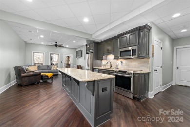 This stunning residence boasts 4 spacious bedrooms and 3.5 baths on Cleveland Country Club  in North Carolina - for sale on GolfHomes.com, golf home, golf lot