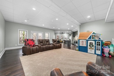 This stunning residence boasts 4 spacious bedrooms and 3.5 baths on Cleveland Country Club  in North Carolina - for sale on GolfHomes.com, golf home, golf lot