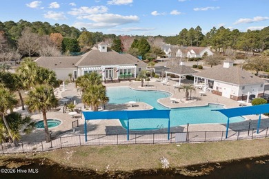 Welcome to easy living in this beautifully maintained home on Sandpiper Bay Golf and Country Club in North Carolina - for sale on GolfHomes.com, golf home, golf lot