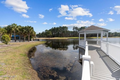 Welcome to easy living in this beautifully maintained home on Sandpiper Bay Golf and Country Club in North Carolina - for sale on GolfHomes.com, golf home, golf lot