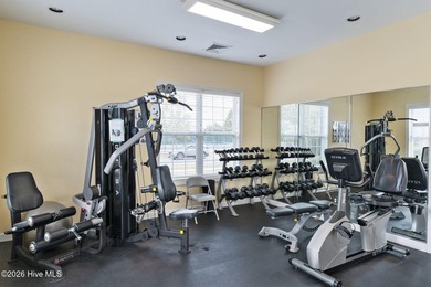 Welcome to easy living in this beautifully maintained home on Sandpiper Bay Golf and Country Club in North Carolina - for sale on GolfHomes.com, golf home, golf lot