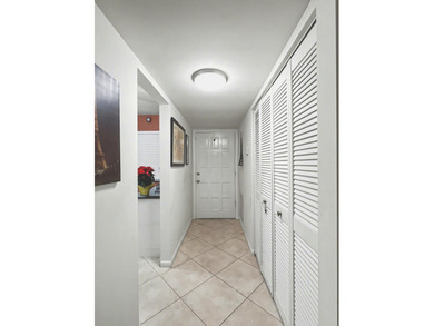 This bright and spacious condo features an open living/dining on Fountains Golf and Country Club in Florida - for sale on GolfHomes.com, golf home, golf lot