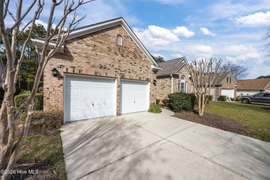 Welcome to easy living in this beautifully maintained home on Sandpiper Bay Golf and Country Club in North Carolina - for sale on GolfHomes.com, golf home, golf lot