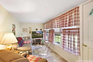 This charming two-bedroom, two-bathroom home has been lovingly on Leisure Village Golf Course in Illinois - for sale on GolfHomes.com, golf home, golf lot