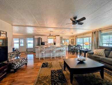 This immaculate home exudes charm and elegance, perfectly on Grasslands Golf and Country Club in Florida - for sale on GolfHomes.com, golf home, golf lot