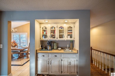 Exceptional 6-bedroom ranch with a fully finished walkout on Rolling Hills Country Club in Kentucky - for sale on GolfHomes.com, golf home, golf lot