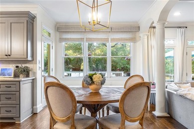 Welcome to this beautifully renovated home tucked away on a on The Golf Club of Georgia in Georgia - for sale on GolfHomes.com, golf home, golf lot