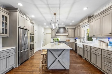 Welcome to this beautifully renovated home tucked away on a on The Golf Club of Georgia in Georgia - for sale on GolfHomes.com, golf home, golf lot