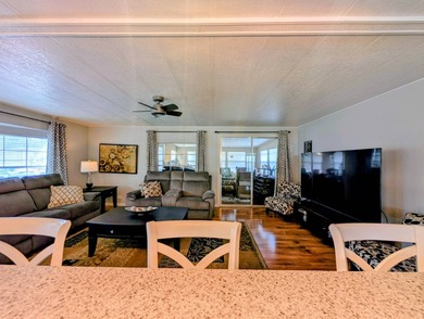 This immaculate home exudes charm and elegance, perfectly on Grasslands Golf and Country Club in Florida - for sale on GolfHomes.com, golf home, golf lot