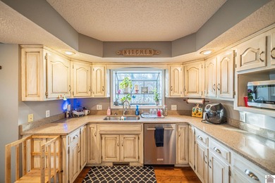 Exceptional 6-bedroom ranch with a fully finished walkout on Rolling Hills Country Club in Kentucky - for sale on GolfHomes.com, golf home, golf lot