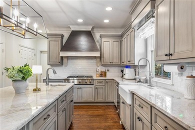 Welcome to this beautifully renovated home tucked away on a on The Golf Club of Georgia in Georgia - for sale on GolfHomes.com, golf home, golf lot