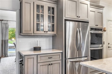 Welcome to this beautifully renovated home tucked away on a on The Golf Club of Georgia in Georgia - for sale on GolfHomes.com, golf home, golf lot