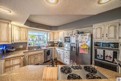 Exceptional 6-bedroom ranch with a fully finished walkout on Rolling Hills Country Club in Kentucky - for sale on GolfHomes.com, golf home, golf lot