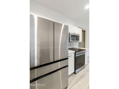 Turn-key, stunningly remodeled San Remo villa in the highly on Oakwood Golf Club  in Arizona - for sale on GolfHomes.com, golf home, golf lot