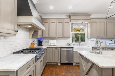 Welcome to this beautifully renovated home tucked away on a on The Golf Club of Georgia in Georgia - for sale on GolfHomes.com, golf home, golf lot