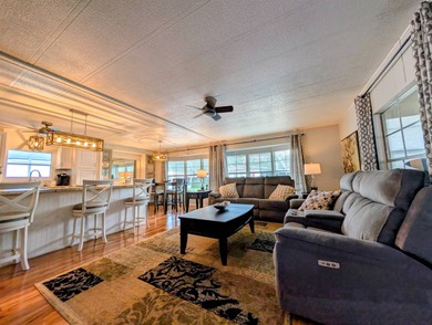 This immaculate home exudes charm and elegance, perfectly on Grasslands Golf and Country Club in Florida - for sale on GolfHomes.com, golf home, golf lot