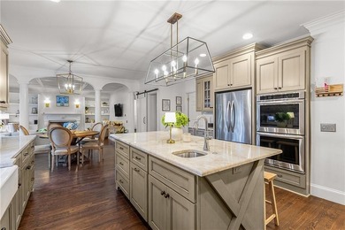 Welcome to this beautifully renovated home tucked away on a on The Golf Club of Georgia in Georgia - for sale on GolfHomes.com, golf home, golf lot