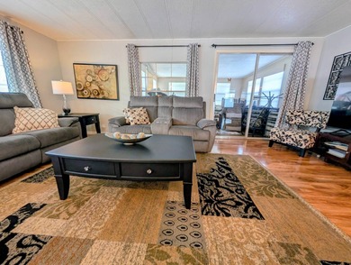 This immaculate home exudes charm and elegance, perfectly on Grasslands Golf and Country Club in Florida - for sale on GolfHomes.com, golf home, golf lot