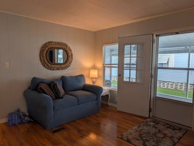 This immaculate home exudes charm and elegance, perfectly on Grasslands Golf and Country Club in Florida - for sale on GolfHomes.com, golf home, golf lot