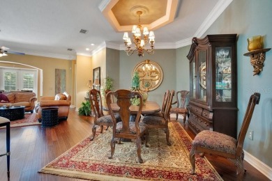 Experience refined living in this exquisitely remodeled on Grasslands Golf and Country Club in Florida - for sale on GolfHomes.com, golf home, golf lot