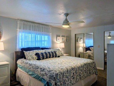 This immaculate home exudes charm and elegance, perfectly on Grasslands Golf and Country Club in Florida - for sale on GolfHomes.com, golf home, golf lot