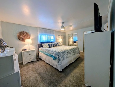 This immaculate home exudes charm and elegance, perfectly on Grasslands Golf and Country Club in Florida - for sale on GolfHomes.com, golf home, golf lot