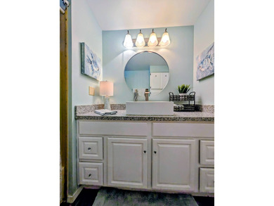 This immaculate home exudes charm and elegance, perfectly on Grasslands Golf and Country Club in Florida - for sale on GolfHomes.com, golf home, golf lot