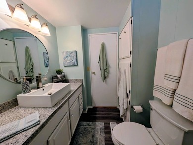 This immaculate home exudes charm and elegance, perfectly on Grasslands Golf and Country Club in Florida - for sale on GolfHomes.com, golf home, golf lot