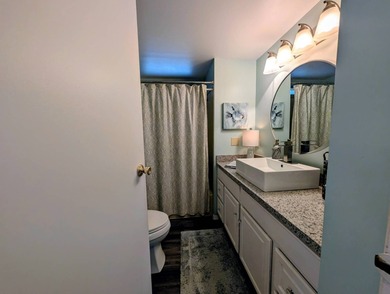 This immaculate home exudes charm and elegance, perfectly on Grasslands Golf and Country Club in Florida - for sale on GolfHomes.com, golf home, golf lot