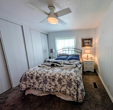 This immaculate home exudes charm and elegance, perfectly on Grasslands Golf and Country Club in Florida - for sale on GolfHomes.com, golf home, golf lot