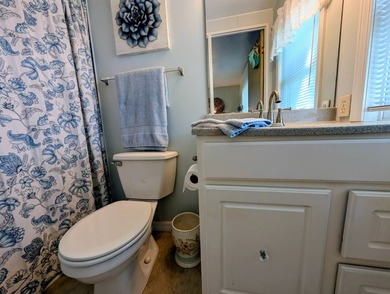This immaculate home exudes charm and elegance, perfectly on Grasslands Golf and Country Club in Florida - for sale on GolfHomes.com, golf home, golf lot