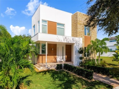 Built by Barcellona Homes in 2022, this two-story contemporary on Lake Nona Golf Club, Inc. in Florida - for sale on GolfHomes.com, golf home, golf lot