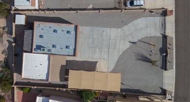 If desert living, open space, and room for your RVs and toys are on Las Barrancas Golf Course in Arizona - for sale on GolfHomes.com, golf home, golf lot