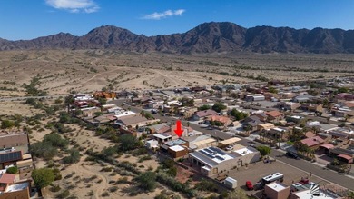 If desert living, open space, and room for your RVs and toys are on Las Barrancas Golf Course in Arizona - for sale on GolfHomes.com, golf home, golf lot