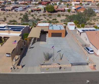 If desert living, open space, and room for your RVs and toys are on Las Barrancas Golf Course in Arizona - for sale on GolfHomes.com, golf home, golf lot