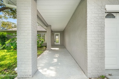 Experience resort-style living in the highly sought-after Timber on Timber Pines Golf Course in Florida - for sale on GolfHomes.com, golf home, golf lot