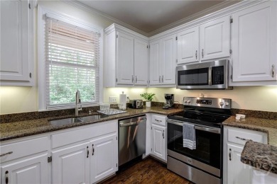 Discover the perfect blend of Southern charm and modern comfort on Great Waters Course At Reynolds Plantation in Georgia - for sale on GolfHomes.com, golf home, golf lot