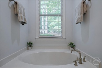 Discover the perfect blend of Southern charm and modern comfort on Great Waters Course At Reynolds Plantation in Georgia - for sale on GolfHomes.com, golf home, golf lot