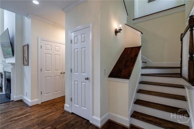 Discover the perfect blend of Southern charm and modern comfort on Great Waters Course At Reynolds Plantation in Georgia - for sale on GolfHomes.com, golf home, golf lot