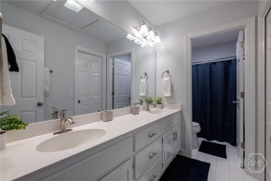 Discover the perfect blend of Southern charm and modern comfort on Great Waters Course At Reynolds Plantation in Georgia - for sale on GolfHomes.com, golf home, golf lot