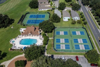 Under contract-accepting backup offers. NEW PRICE!! A couple on Country Club of Mount Dora in Florida - for sale on GolfHomes.com, golf home, golf lot