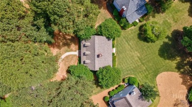 Discover the perfect blend of Southern charm and modern comfort on Great Waters Course At Reynolds Plantation in Georgia - for sale on GolfHomes.com, golf home, golf lot