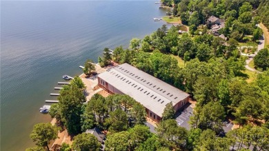 Discover the perfect blend of Southern charm and modern comfort on Great Waters Course At Reynolds Plantation in Georgia - for sale on GolfHomes.com, golf home, golf lot