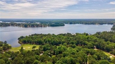 Discover the perfect blend of Southern charm and modern comfort on Great Waters Course At Reynolds Plantation in Georgia - for sale on GolfHomes.com, golf home, golf lot