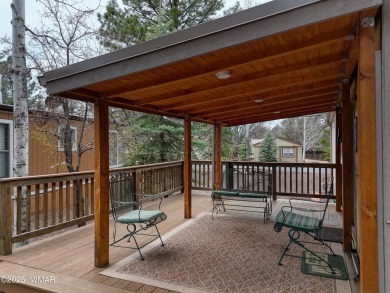 Discover your perfect mountain escape in this immaculate and on Pinetop Lakes Golf and Country Club in Arizona - for sale on GolfHomes.com, golf home, golf lot