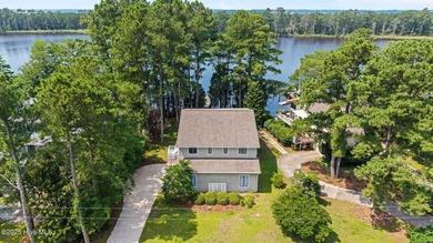 Don't miss this rare opportunity to own a waterfront home with a on Harbour Point Golf Club in North Carolina - for sale on GolfHomes.com, golf home, golf lot