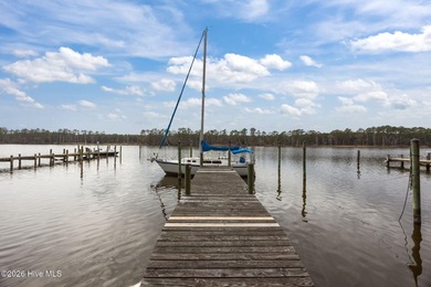 Don't miss this rare opportunity to own a waterfront home with a on Harbour Point Golf Club in North Carolina - for sale on GolfHomes.com, golf home, golf lot