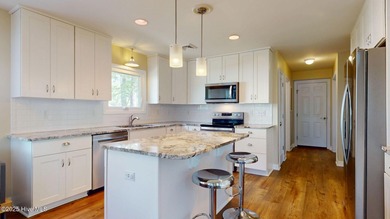 Don't miss this rare opportunity to own a waterfront home with a on Harbour Point Golf Club in North Carolina - for sale on GolfHomes.com, golf home, golf lot